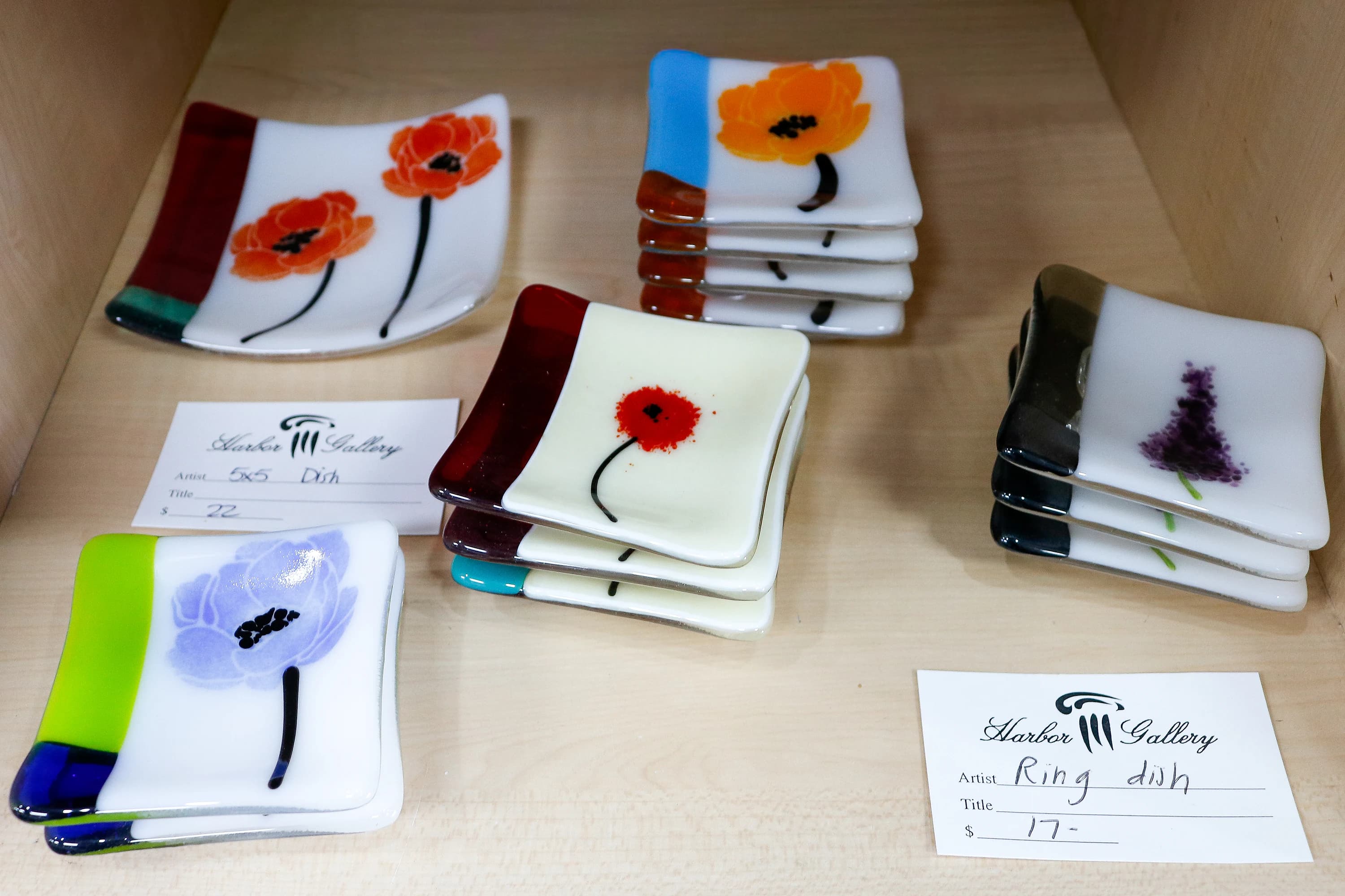 Fused-glass ring dishes with hand-painted floral motifs