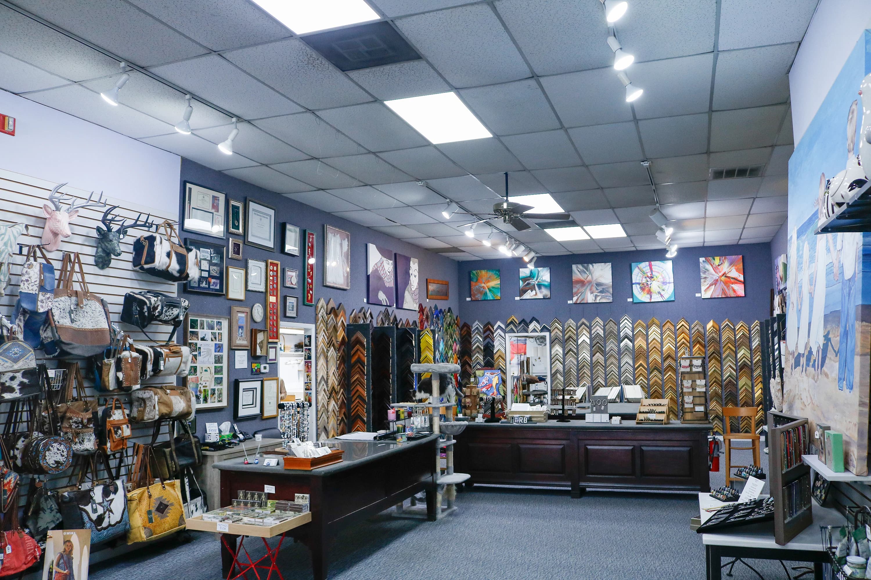 Close-up gallery wall with framed artwork on display