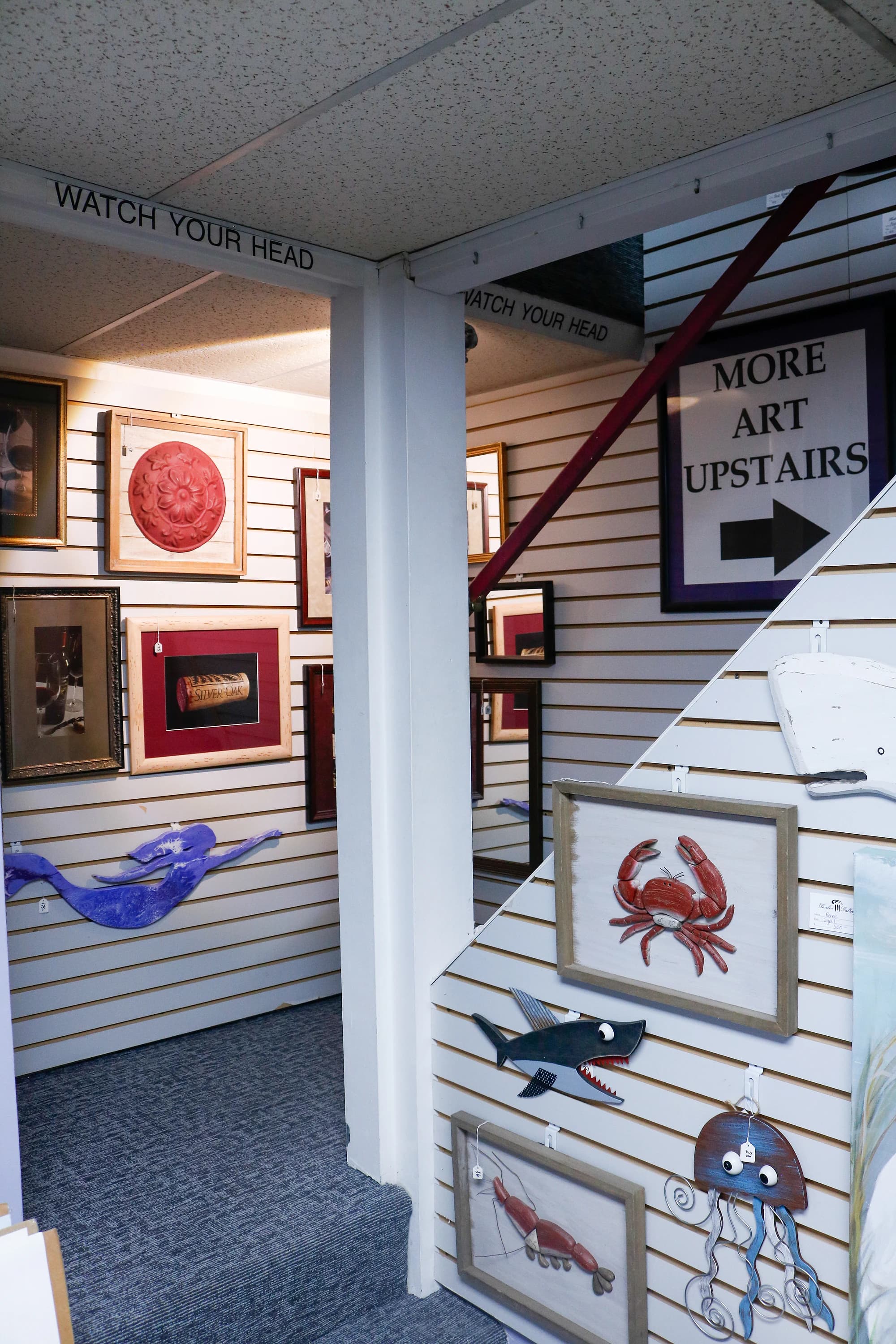 A coastal work framed in Antique Gold